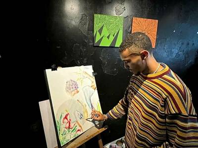 Le jeune peintre Thomas Belval